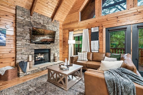 Relax in the cozy living room in your mountain oasis