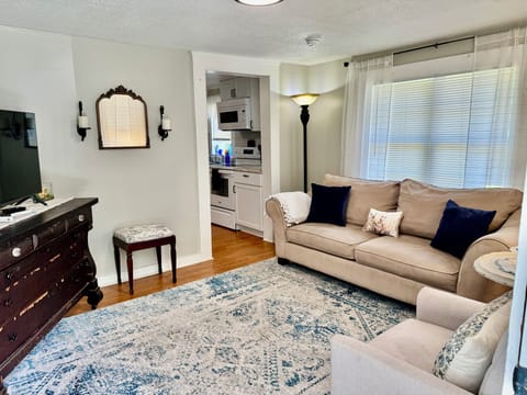 Living room and entrance to kitchen