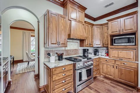The kitchen is fully equipped with modern appliances.