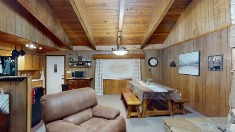 Cozy living and dining area for you to cozy up by the fire or enjoy your meal at the table.