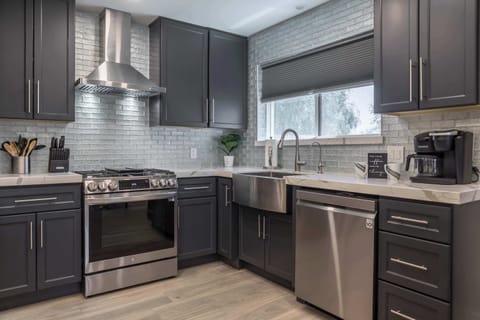 Gorgeous, open, large stocked kitchen with stainless steel appliances