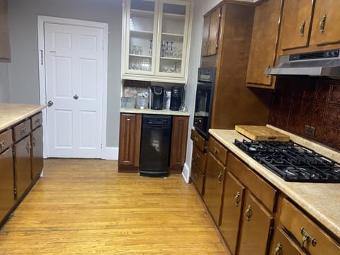 The kitchen is also equipped with a coffee station & toaster.