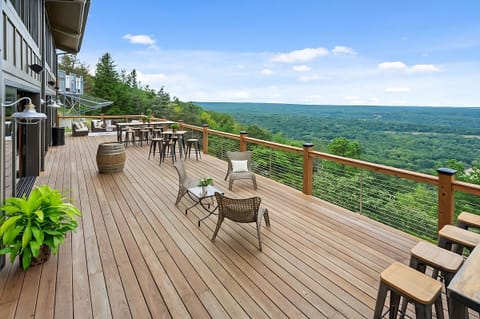 Soak up panoramic forest views from the oversized deck.