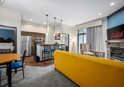 Step into a bright suite with fireplace and open layout.