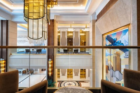 Stroll the mezzanine and admire the grand, art-filled atrium.