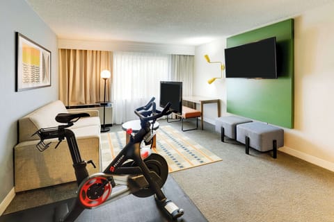 Keep up your routine with an in-room bike and open space.