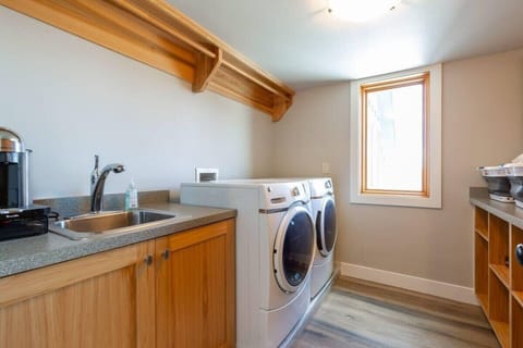 Located near the upstairs bedrooms is a laundry room so you can keep up with any laundry needs with ease.