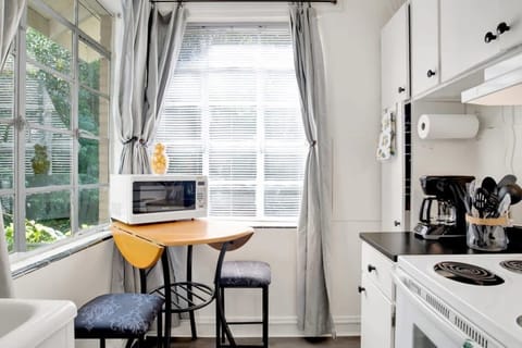 Clean kitchen with a simple dining area