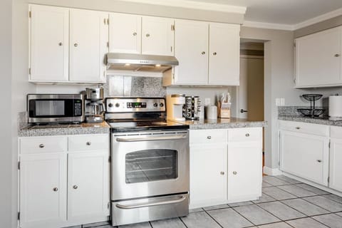 Fully equipped kitchen with spices, a drip coffee maker & a Keurig. Coffee and sugar provided.