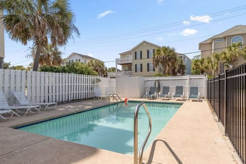 Dive into vacation mode in the sparkling outdoor pool—just steps from your door.