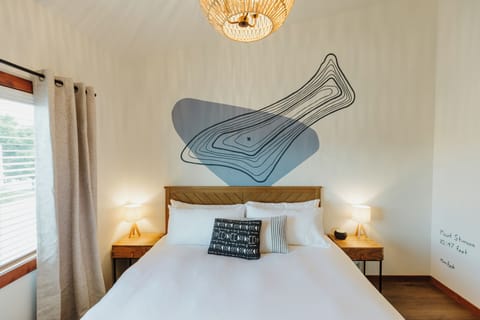 [King bedroom] You'll love our high-thread-count organic cotton sheets.