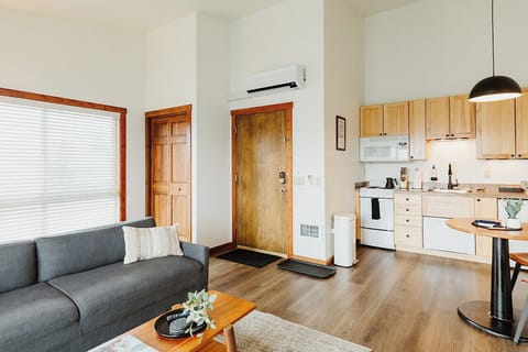 [Living area] Our vaulted ceilings welcome plenty of light into the 
suite.