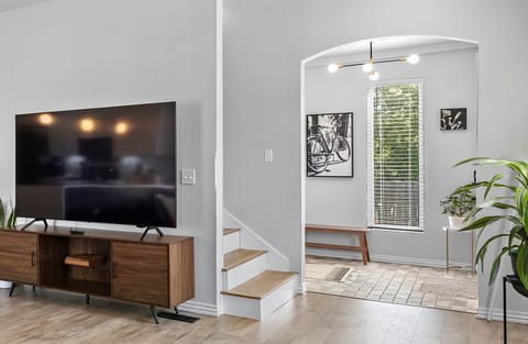 Entryway to Living Room / Kitchen and Stairs