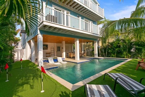 Front entry pool area with putt putt