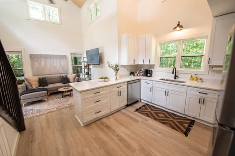 Abundant storage for your belongings. Our well-equipped kitchen caters to meals of any scale – from small bites to grand feasts!