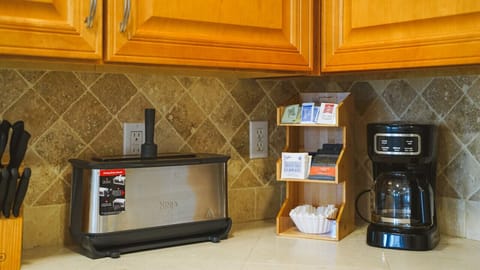 Take a break from the hustle and bustle with a cup of joe in our cozy kitchen corner