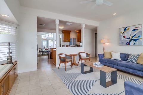 This living area is ideal for entertaining as it opens up to the kitchen.