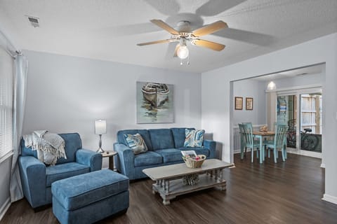 Open and spacious living area with new comfortable furnishings.