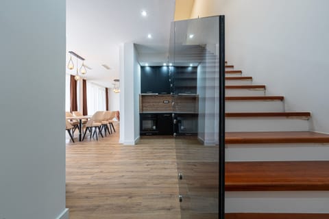Fabulous glassed staircase leading to the upper floor