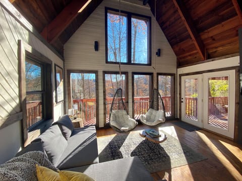 Open-concept living with forest views from every window—nature meets comfort.