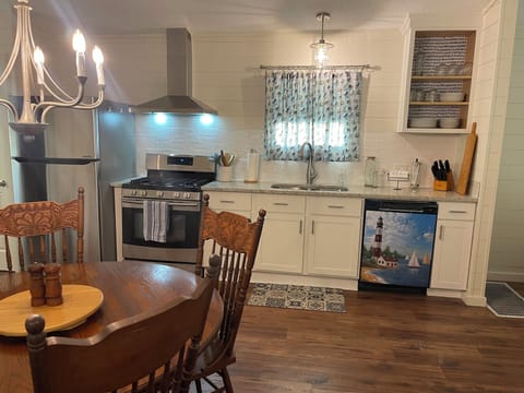 Well appointed kitchen with new stainless appliances and granite countertops