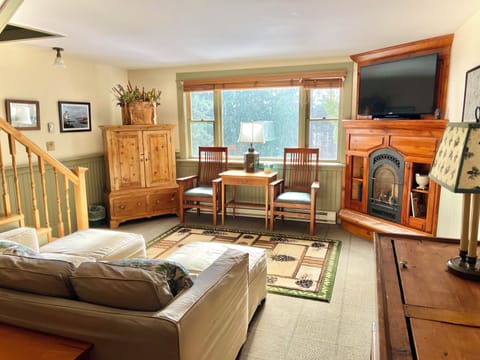 Living room with gas fireplace & pull out  Queen sofa. Roll away also available.