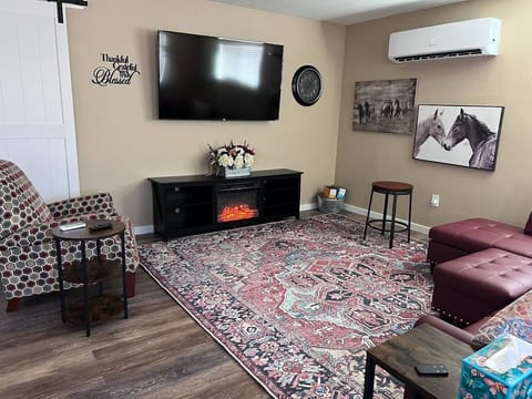 Living room, electric fireplace, Roku TV, all apps loaded ready for your log in.