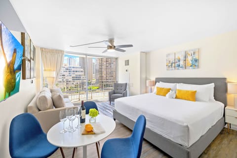 This condo features a king-size bed, pull-out sleeper sofa, dining area with 4 chairs, and a central AC!