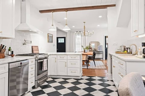 This is our fully stocked kitchen with A gas range and wet bar!