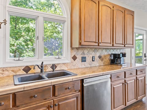 Main level kitchen with carafe and single pod coffee brewers