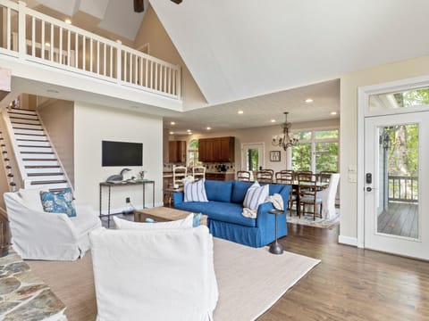 Main level great room with television