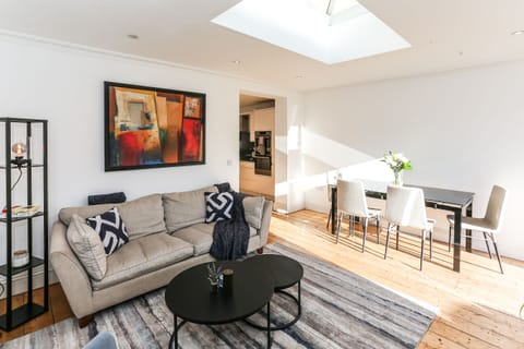 Open Plan living room, dining and kitchen leading in to the garden