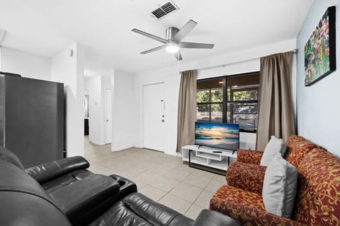 Comfortable living room with large screen TV