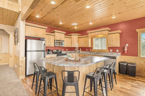 Kitchen stocked with basic cooking utensils, toaster, coffee maker, etc.