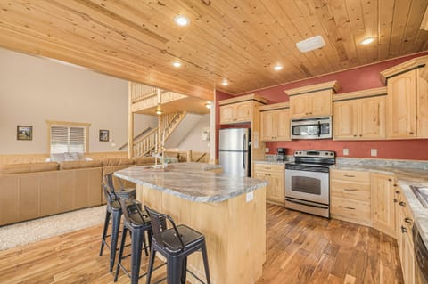 Kitchen stocked with basic cooking utensils, toaster, coffee maker, etc.