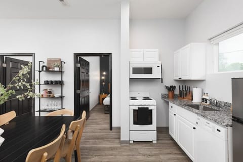 Fully-stocked kitchen off of the dining area with everything you'll need to cook and make yourself at home.