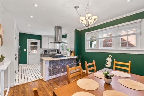 Spacious dining room and modern kitchen