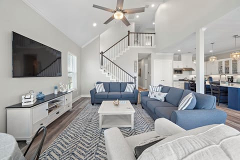 Relax and enjoy the beachy vibe in this spacious living room!