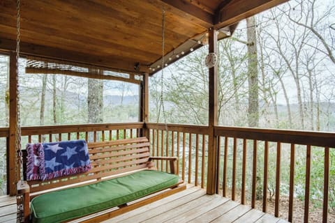 Winter mountain view with porch swing, perfect for your morning cup of coffee!