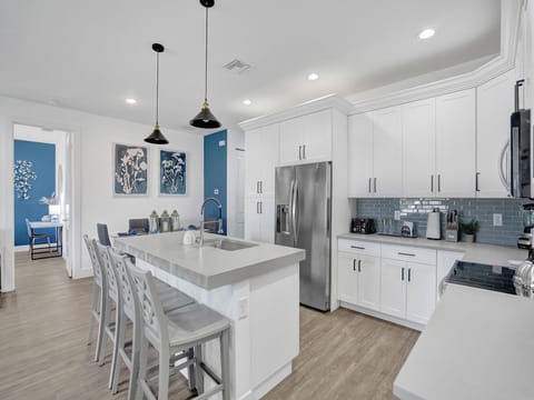 A bright kitchen ready for family meals and morning coffee.