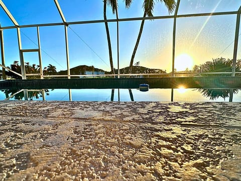 Sunrise from pool to intercoastal waters backyard