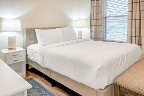 Large bedroom with memory foam mattress and nice sized closet and dresser with m