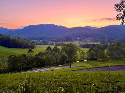 Sunset view from our Fire Pit area & Rocking Chair Front Porch.