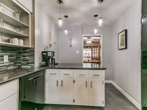 Breakfast nook with three stools for in-kitchen dining.