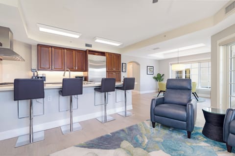 Gather around the spacious island for casual breakfasts or evening drinks.