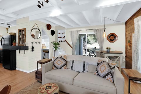 Upon entrance you are greeted by a bright inviting living space