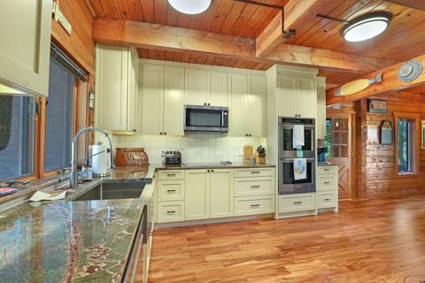 Open kitchen with ample storage and countertop space