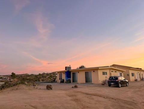 The Desert Star Home at dusk.  
