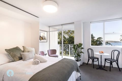 Open plan light filled studio apartment w blockout blinds