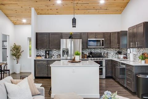 Well stocked including coffee, creamer, tea, olive oil, vinegar, salt, pepper